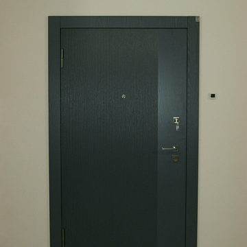 Дверь в квартиру с накладкой МДФ